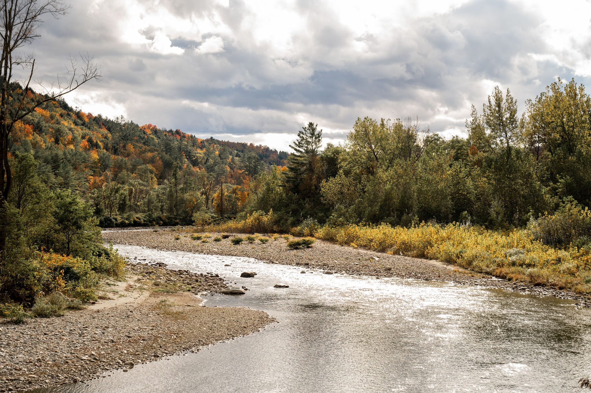 The White River curving around a bend with autumn foliage lining the bank.