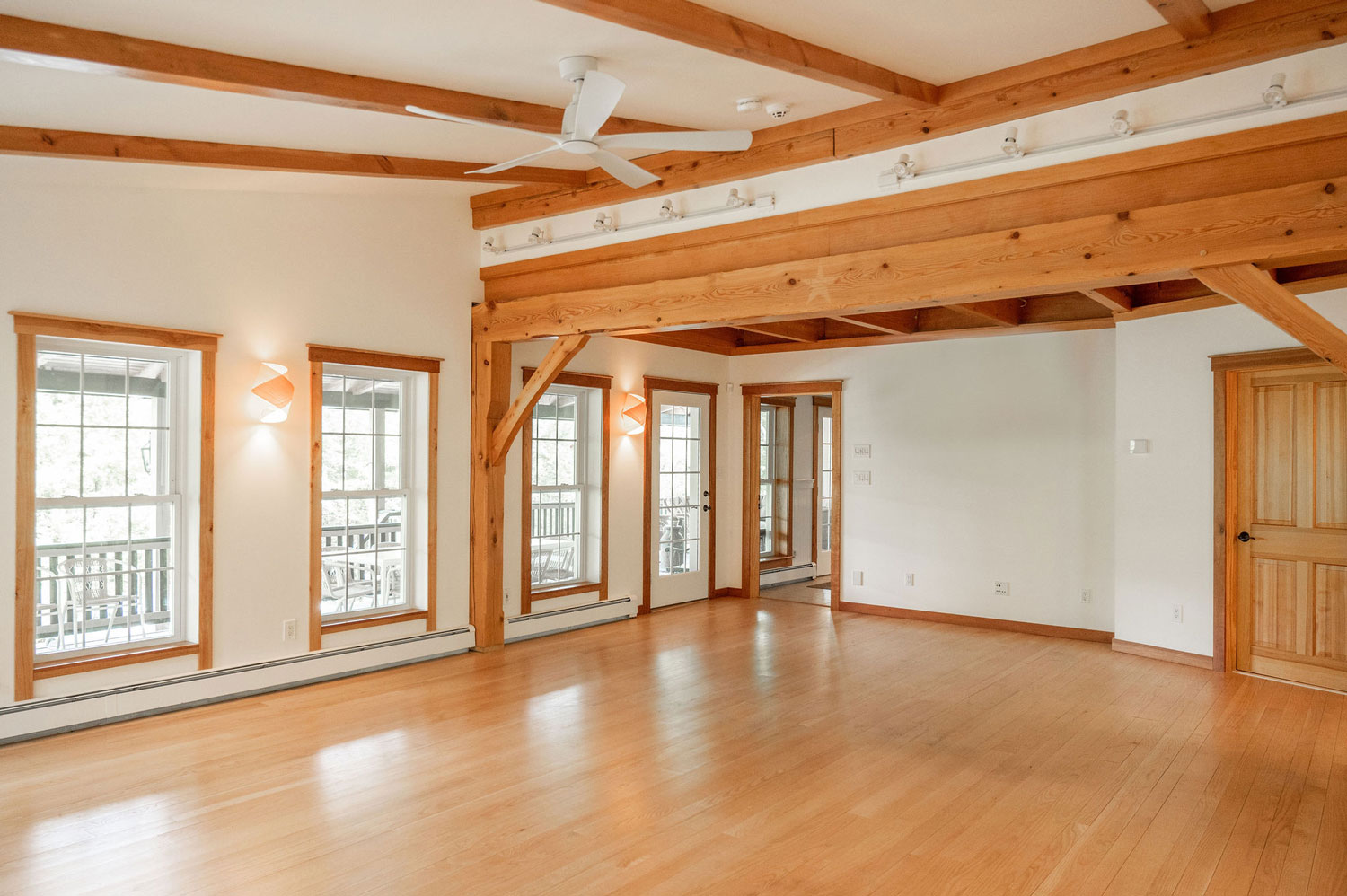 The Cobble House music room The music room with a bank of windows looking out onto the veranda