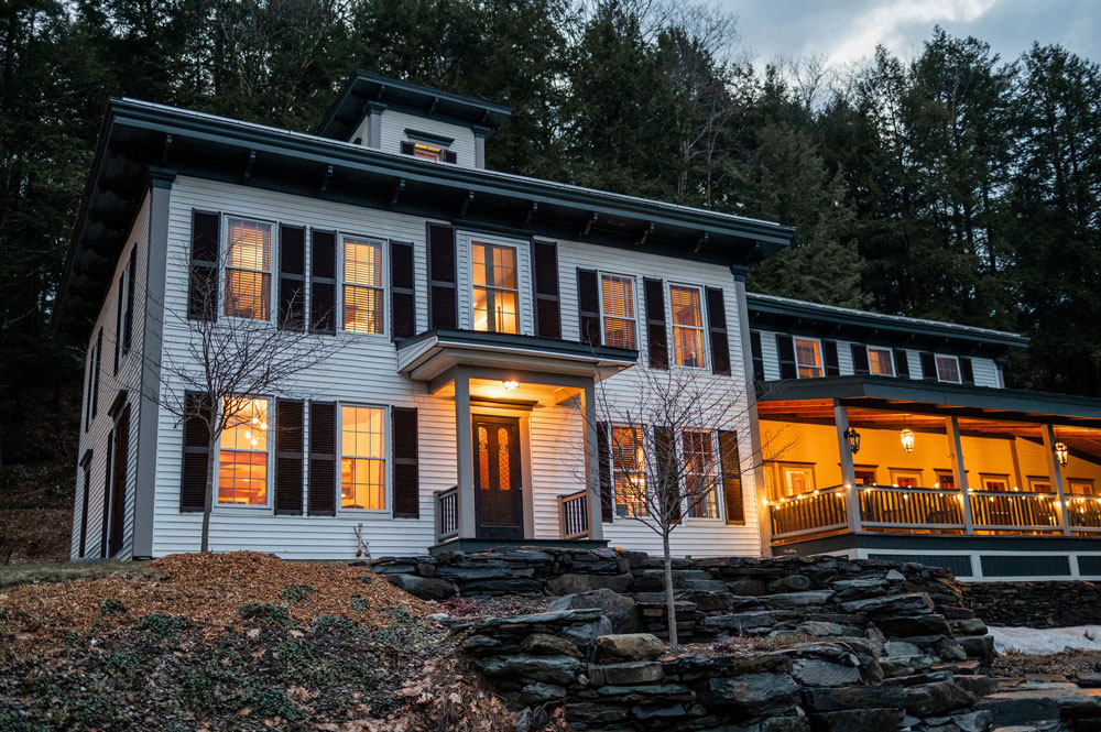 The Cobble House evening Cobble House in the evening with the veranda lit with lanterns